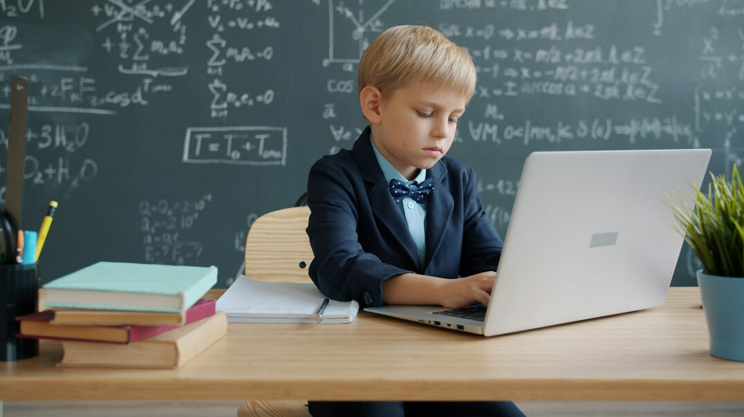 student learning programming in classroom
