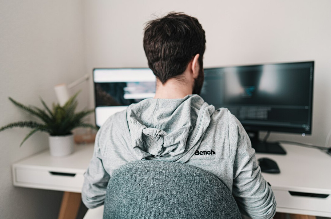 person coding at home