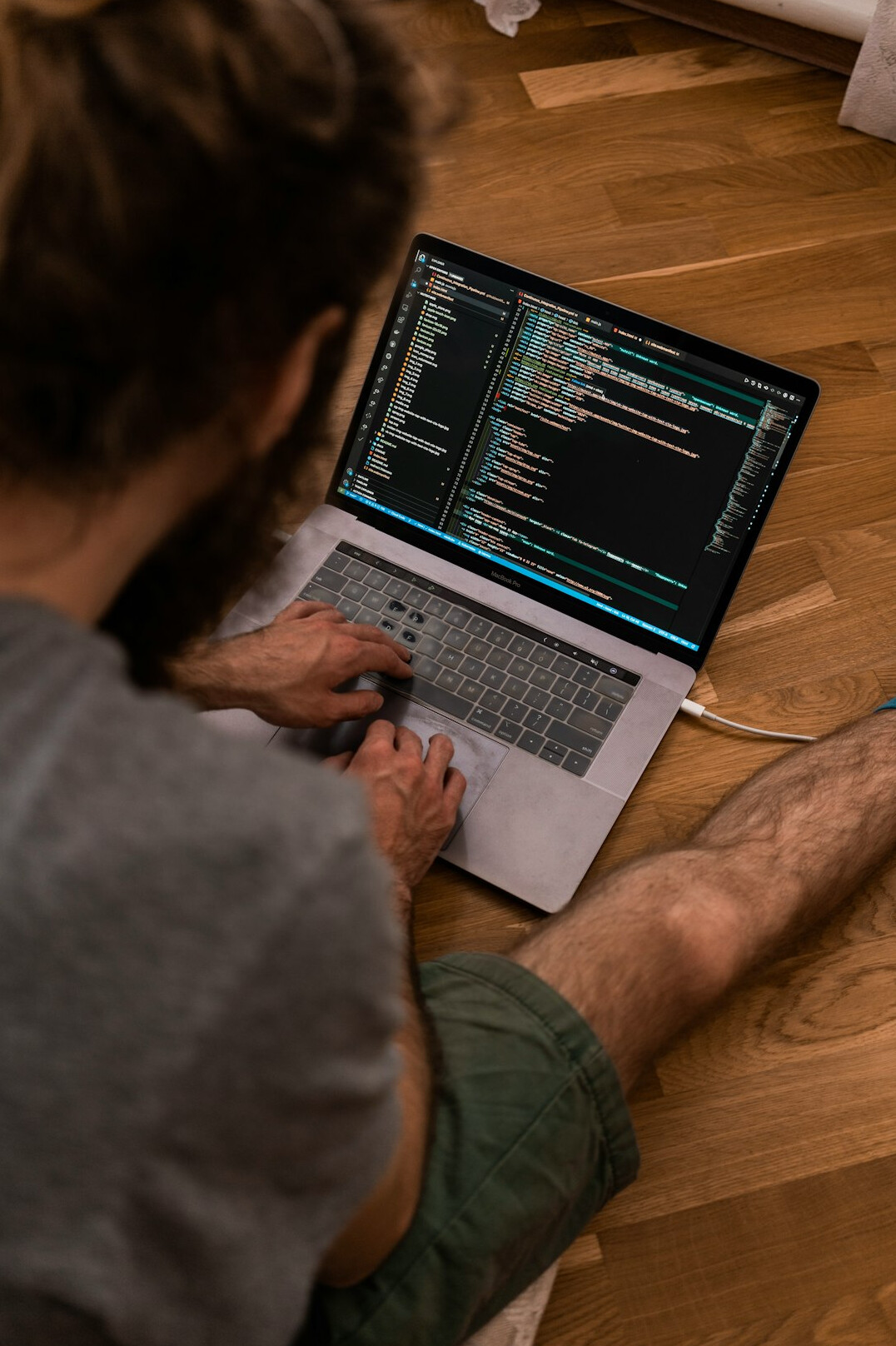hands on laptop coding